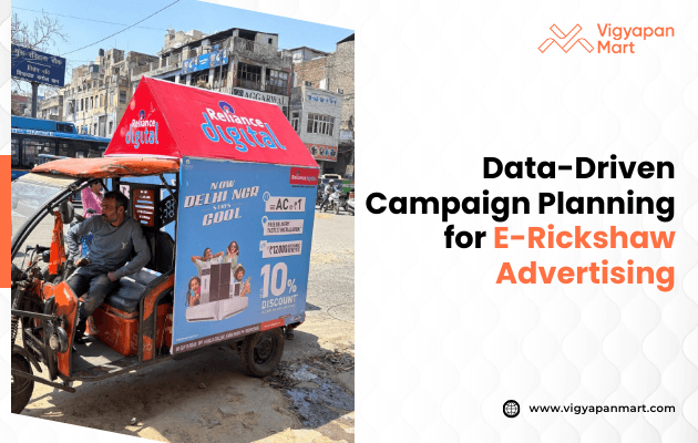 A red-roofed e-rickshaw displaying a Reliance Digital ad with a 10% discount offer. Text beside it reads "Data-Driven Campaign Planning for E-Rickshaw Advertising.