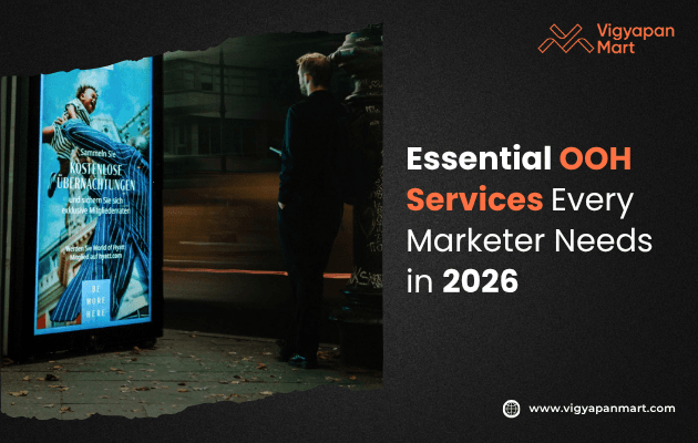A person stands at a bus stop, looking at an illuminated ad display. Text reads: "Essential OOH Services Every Marketer Needs in 2026."